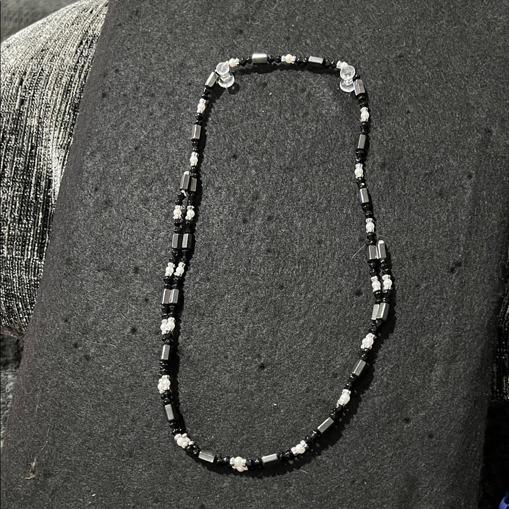 Two Magnetic Necklaces Black/white and Green/gun metal